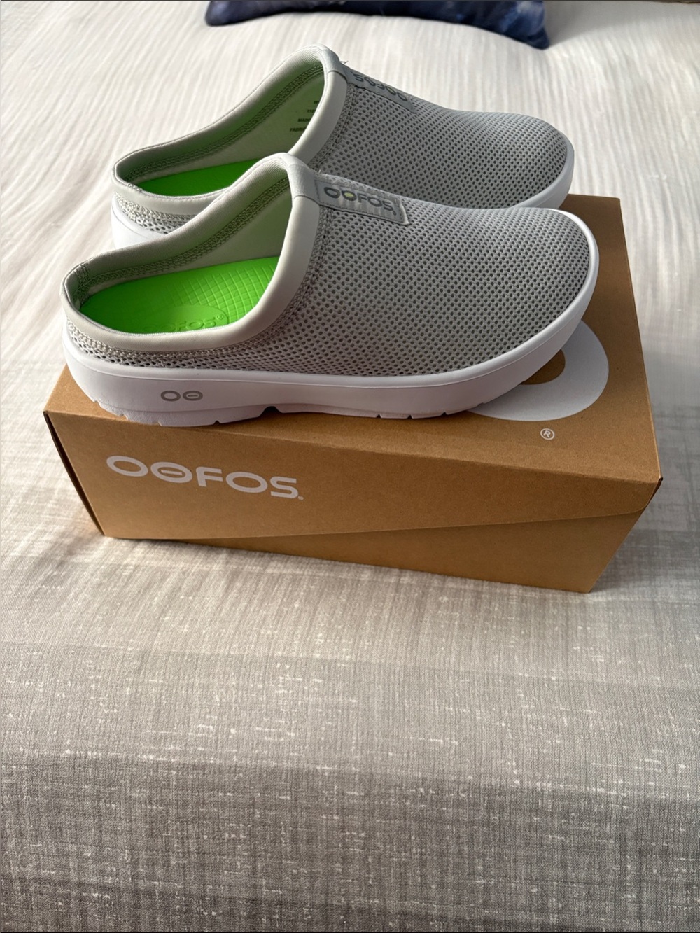 OOFOS women’s Light Gray Slip-On Recovery Clog with Bright Green Insole